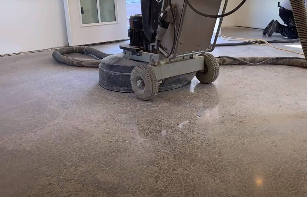 Does weather affect polished concrete maintenance, especially in Auckland's varying climate?