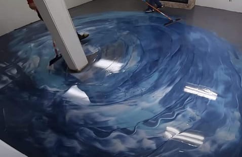 How long does it take for a newly installed metallic epoxy floor to cure in Auckland's climate?